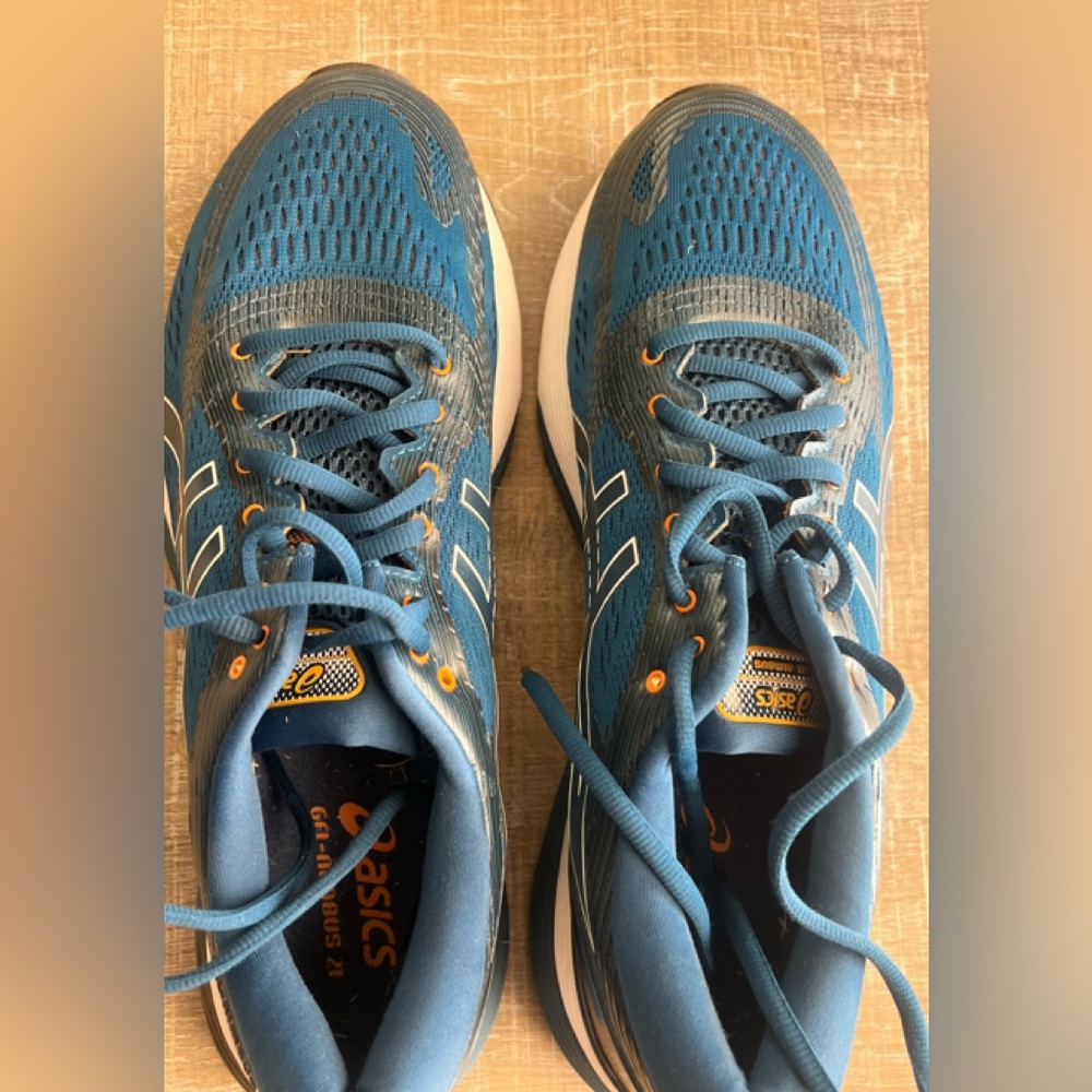 Asics Blue and Orange Running Shoes
Gel Nimbus